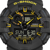 Casio G-SHOCK GA700CY-1A analogue digital watch with black resin band, oversized black and yellow dial, and shock-resistant design.