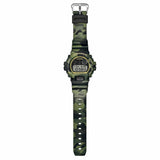 Casio G-Shock DW6900CMG-3D close-up of the green camouflage MAP-printed resin band, featuring the exclusive G-Shock pattern that playfully conceals the iconic G-mark.