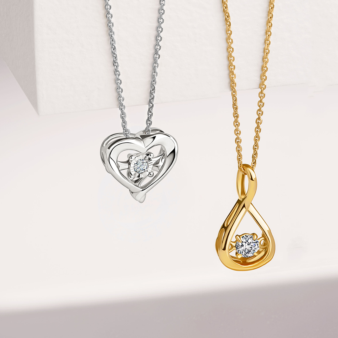 Dancing Diamond Heart Necklace in Sterling Silver
