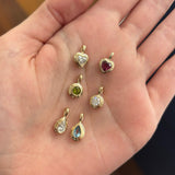 93PDRDPE1YRound Peridot Double Bezel Pendant93PDPSST1YPear-Cut Swiss Blue Topaz Double Bezel Pendant93PDHTRH1YHeart Rhodolite Garnet Double Bezel PendantLGNDBR300.30 TDW Round Lab-Grown Diamond Double Bezel PendantLGNDBP300.30 TDW Pear-Cut Lab-Grown Diamond Double Bezel PendantLGNDBH300.30 TDW Heart Lab-Grown Diamond Double Bezel Pendant
