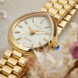 The Citizen L Rainell EM1202-50P styled for everyday wear, with its pear-shaped, jewellery-like silhouette reflecting Citizen's Eco-Drive solar-powered design.