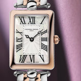 Frederique Constant Classic Quartz Women's Watch FC-200MPW2AC2B styled in a lifestyle setting, reflecting its Art Déco-inspired, jewellery-led design suited to dressier occasions. The rose gold-tone finish and mother-of-pearl dial complement a refined, feminine look.
