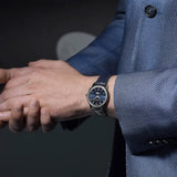 Frederique Constant 37mm Quartz Moonphase Watch FC-206N3S6 worn on the wrist, demonstrating the comfortable fit of its 37mm case and leather strap. The moonphase display adds a subtle decorative detail to the wrist.
