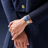 Frederique Constant Classic Quartz 37mm Watch FC-206N3S6B worn on the wrist, demonstrating the comfortable fit of its 37mm case and Milanese mesh bracelet. The moonphase display adds a subtle decorative detail to the wrist.