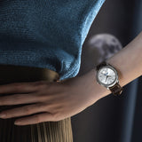 Frederique Constant 37mm Quartz Moonphase Watch FC-206S3S6 worn on the wrist, demonstrating the comfortable fit of its 37mm case and leather strap. The moonphase display adds a subtle decorative detail to the wrist.