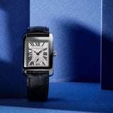 Frederique Constant Carrée Quartz Watch FC-235S2C6 styled in a lifestyle setting, reflecting its Art Deco-inspired design suited to both everyday and formal occasions. The silver-tone dial and stainless steel case complement a refined, vintage-influenced look.