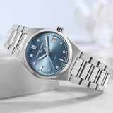 Frederique Constant Highlife Women's 31mm Quartz Stainless Steel Watch FC-240LND2NH26B styled in a lifestyle setting, reflecting its versatile design for both everyday and dressier occasions. The icy blue dial and stainless steel case complement a range of outfits.