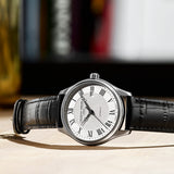 Frederique Constant Classic Automatic Men's 40mm Watch FC-303MC5B6 styled in a lifestyle setting, reflecting its refined, versatile design suited to both business and formal occasions. The silver dial and rose gold-tone case complement a classic, polished look.