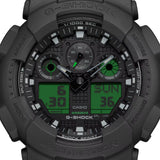 Casio G-Shock GA100BEG-1A front view — all-black round resin case with electro green LCD accents, analogue-digital three-dial layout. 55mm x 51.2mm x 16.9mm, 70 grams, shock resistant, magnetic resistant, 200M water resistant.