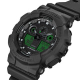 Casio G-Shock GA100BEG-1A front view — all-black round resin case with electro green LCD accents, analogue-digital three-dial layout. 55mm x 51.2mm x 16.9mm, 70 grams, shock resistant, magnetic resistant, 200M water resistant.