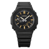 From this angle, the Casio G-Shock Analogue Digital Men's Watch GA2100LXB-1A9 reveals the octagonal bezel's crisp matte facets and the warm gold shimmer of the vapour-deposited hour markers against the all-black dial.