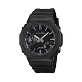 The Casio G-Shock Analogue Digital Men's Watch GA2100LXB-1A features a deep matte black anti-reflective textured dial with slim extended hands and silver vapour-deposited hour markers, set within a 48.5mm Carbon Core Guard black resin octagonal case.