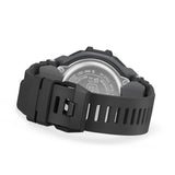 Casio G-Shock GBD300-1 close-up of the all-black bio-based urethane band with dotted skin-contact texture, flexible fine-resin underside covering, 5mm-interval adjustment holes for a precise fit, and a standard buckle clasp.