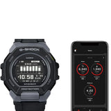 Casio G-Shock G-Squad GBD300-1 watch with phone to show Bluetooth and app features. 