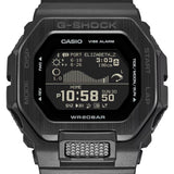 Casio G-LIDE GBX100NS-1D digital surf watch with black resin band, MIP LCD display, Bluetooth connectivity, and tide graph functions.
