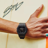 Casio G-LIDE GBX100NS-1D digital surf watch with black resin band, MIP LCD display, Bluetooth connectivity, and tide graph functions - on hand