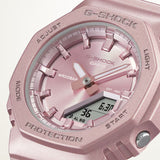 Casio G-Shock GMAP2100ST-4AD front view — pearlescent matte pink octagonal bio-based resin case and band, metallic vapour deposition pink dial, minimalist analogue-digital display. 46mm x 40.2mm x 11.2mm, 40 grams, shock resistant, 200M water resistant.