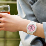 Casio G-Shock GMAP2100SR-7A front view showcasing the compact 40.2mm translucent resin case with vapor deposition shimmering glass, streamlined octagonal bezel, minimalist analogue-digital face with hand shift feature, and see-through band — the SR summer series in translucent white.