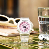 Casio G-Shock GMAP2100SR-7A front view — translucent clear resin octagonal case with full vapor deposition shimmering glass, minimalist analogue-digital dial. 46mm x 40.2mm x 11.2mm, 40 grams, shock resistant, 200M water resistant.