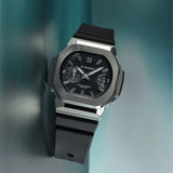 Close-up of the dial on the Casio G-SHOCK 2500 Series Quartz Men’s Watch GMC2500-1A, 46.7mm case. The small seconds subdial, date window and parallel-line hands are shown in detail.