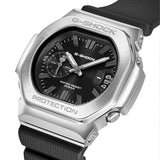 Three-quarter angle view of the Casio G-SHOCK 2500 Series Quartz Men’s Watch GMC2500-1A, 46.7mm case, highlighting the silver bezel and rounded octagonal case. The black dial and bar indexes are visible.