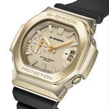 Three-quarter angle view of the Casio G-SHOCK 2500 Series Quartz Men’s Watch GMC2500G-9A, 46.7mm case, highlighting the gold ion-plated bezel and rounded octagonal case. The gold dial and bar indexes are visible.