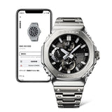 Casio G-Shock GMCB2100ADS-1A front view showcasing the silver and black full-metal octagonal case with forged, cut and polished stainless steel bezel, hairline-finished top surface, fully analogue dial with silvery vapour deposition finish and black auxiliary sub-dials and phone connectivity