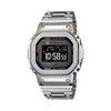 Casio G-Shock GMWBZ5000RC-1D front view, featuring the 43.6mm full stainless steel square case with gradient rainbow ion-plated centre case — a two-stage gold and rainbow IP process — rainbow vapour-deposited glass border, gold IP front screws, high-definition MIP LCD display, and solid stainless steel band, crafted at Yamagata Casio. No two pieces look identical under different light.