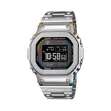 Casio G-Shock GMWBZ5000RC-1D front view, featuring the 43.6mm full stainless steel square case with gradient rainbow ion-plated centre case — a two-stage gold and rainbow IP process — rainbow vapour-deposited glass border, gold IP front screws, high-definition MIP LCD display, and solid stainless steel band, crafted at Yamagata Casio. No two pieces look identical under different light.