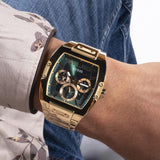 Worn on the wrist, the Guess Phoenix sits comfortably thanks to its balanced 43mm case size. The green sunray dial and gold-tone bracelet combine for a bold, sophisticated look.