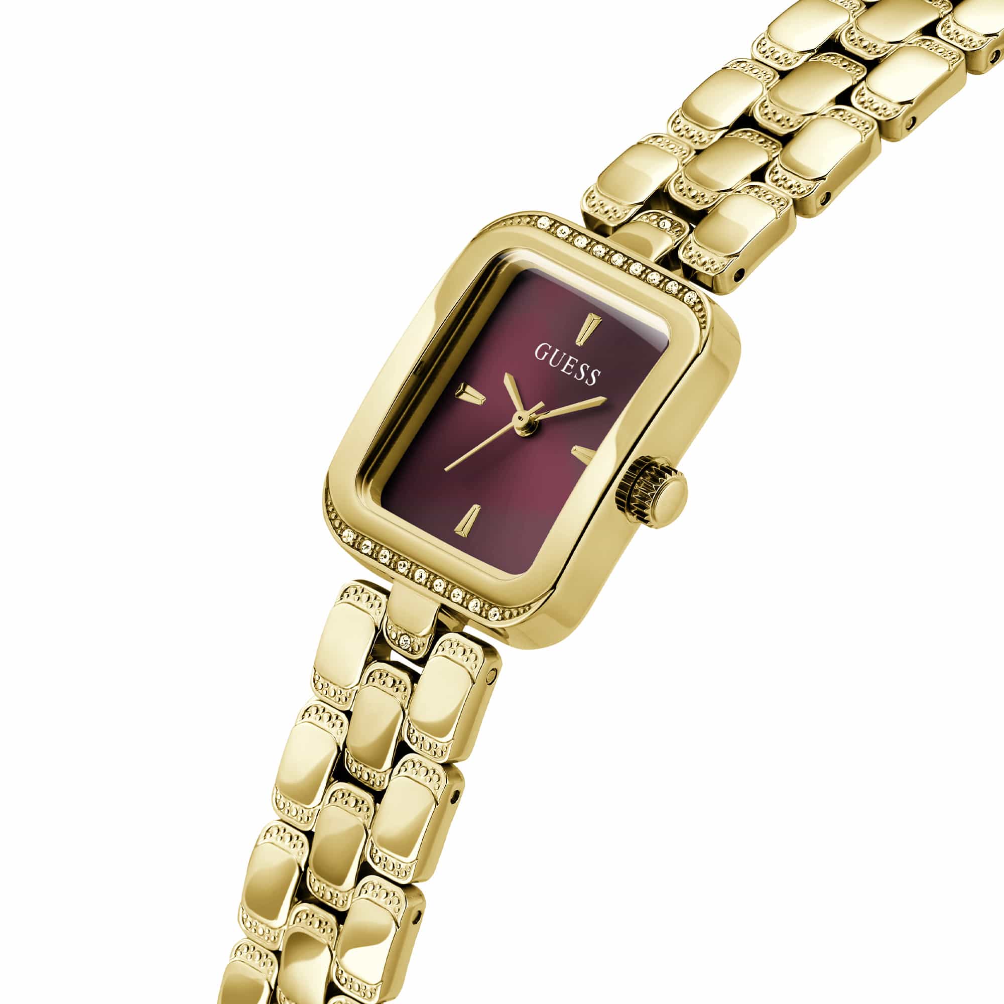 Captured at a three-quarter angle, this view highlights the crystal detailing on the case alongside the burgundy dial. The gold-tone finish catches the light beautifully from this perspective.