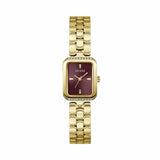 The Guess GW0865L9 is shown face-on, highlighting its 28mm gold-tone rectangular case and sleek burgundy dial. A touch of crystal adorns the case for a subtle, refined sparkle.
