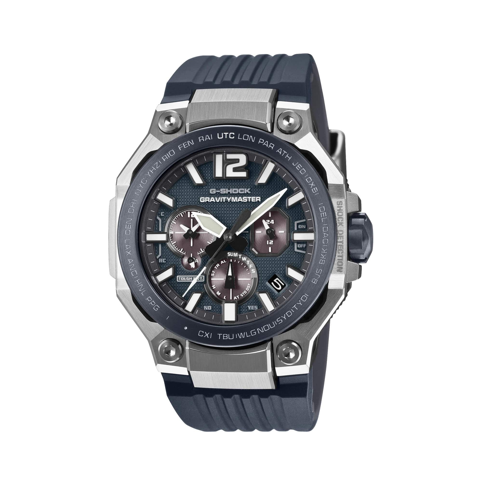 The Casio G-Shock Gravitymaster Solar Men's Watch GWRB3000A-2A features a 47.3mm round case with blue ion-plated bio-based carbon and stainless steel bezel, blue analogue dial with luminous hands and markers, sapphire crystal with anti-reflective coating, and visible shock absorbers — the TOUGH MVT.2 Gravitymaster in blue.