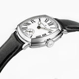 Hamilton American Classic Cushion Mechanical Women’s 30mm Watch H36109710 is shown in close up, revealing the black Roman numerals, railway minute track and small seconds sub-dial. The slim hands stand out against the white dial.