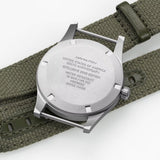 Case Back: Hamilton Khaki Field Mechanical 36mm Watch H69399930 features a protective dust cover safeguarding the H-50 hand-wound movement beneath. This exclusive caliber delivers an extended 80-hour power reserve for reliable everyday timekeeping.