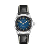 Hamilton Khaki Field Murph Automatic 38mm Watch H70405740 features a blue-to-black gradient dial with a grained stardust-inspired texture, domed Arabic numerals, and cathedral-style hands. The stainless steel case and Super-LumiNova® treatment ensure strong legibility across all lighting conditions.