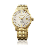 The Seiko Presage Automatic GMT Men’s 40.50mm Watch HCB004J shows its 40.5mm gold-tone stainless steel case with a mirror-finished profile. The pull-out crown sits on the right side of the case.