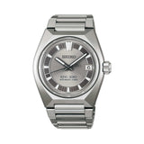 The King Seiko VANAC Automatic 41mm Men's Watch HKF002J features a silver dial with a three-dimensional horizontal pattern, LumiBrite hands and indexes, and a date window. The 41mm bezel-less titanium case is fitted with a box-shaped sapphire crystal.