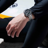 Citizen Promaster Analogue Digital 42mm Men's Watch JV3001-53E - Worn on the wrist, the 42.4mm silver-tone stainless steel case and matching bracelet sit securely for all-day wear. The understated black-and-silver colourway gives it a versatile, everyday-wearable look.