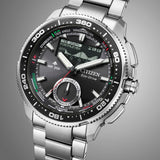 Citizen Promaster Analogue Digital 42mm Men's Watch JV3001-53E - This angle captures the black dial, digital display, and rotating bezel together in one view. The stainless steel case and bracelet remain clearly visible from this perspective.