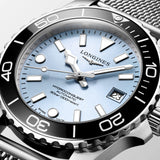 Close-up of the Longines HydroConquest L3.779.4.99.6 dial, showing the frosted blue sunray finish with applied hour markers and Super-LumiNova hands. The double-sided anti-reflective sapphire crystal ensures exceptional clarity and legibility in any lighting condition.