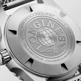 Screw-down caseback of the Longines HydroConquest L3.779.4.99.6, a key feature of its 300-metre water resistance rating. The stainless steel back is engraved with the Longines name, model reference and water resistance specification, reflecting the watch's professional dive credentials.