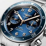 Close-up of the blue sunray dial on the Longines Spirit Flyback Automatic Chronograph Men's 42mm Watch L3.821.4.93.6. The detail shows the small seconds sub-dial at 9 o'clock, the 30-minute counter at 3 o'clock and the central chronograph seconds hand beneath sapphire crystal.