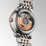 Detailed rear view of the Longines Elegant L4.309.5.80.7 case back, engraved with the Longines name and reference details. The exposed movement beats at 28,800 vibrations per hour with a 45-hour power reserve, offering a glimpse into Swiss watchmaking craftsmanship.