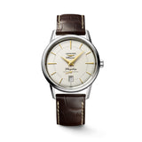 Front view of the Longines Heritage Flagship Automatic Men’s 38.5mm Watch L4.795.4.78.2, showing its silver dial with slim stick markers, dauphine hands and small seconds sub-dial. The round stainless steel case is paired with a leather strap for a classic vintage-inspired look.