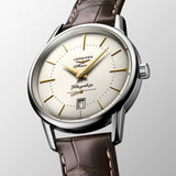 Three-quarter angle view of the Longines Heritage Flagship Automatic Men’s 38.5mm Watch L4.795.4.78.2, showing the case profile and crown. The angle highlights the polished stainless steel case and the slim, elegant lines of this vintage-inspired dress watch.