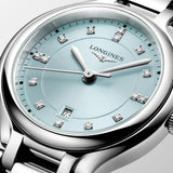 Longines PrimaLuna women’s watch featuring a polished stainless steel bracelet and 30mm round case, with a mint blue sunray dial accented by diamond hour markers, silver-tone hands, date display, and scratch-resistant sapphire crystal. Elegant Swiss luxury timepiece with refined feminine styling.