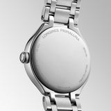 Back of case - Longines PrimaLuna women’s watch featuring a polished stainless steel bracelet and 30mm round case, with a mint blue sunray dial accented by diamond hour markers, silver-tone hands, date display, and scratch-resistant sapphire crystal. Elegant Swiss luxury timepiece with refined feminine styling.