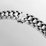 Bracelet from a- Longines PrimaLuna women’s watch featuring a polished stainless steel bracelet and 30mm round case, with a mint blue sunray dial accented by diamond hour markers, silver-tone hands, date display, and scratch-resistant sapphire crystal. Elegant Swiss luxury timepiece with refined feminine styling.