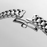 Bracelet from a- Longines PrimaLuna women’s watch featuring a polished stainless steel bracelet and 30mm round case, with a mint blue sunray dial accented by diamond hour markers, silver-tone hands, date display, and scratch-resistant sapphire crystal. Elegant Swiss luxury timepiece with refined feminine styling.